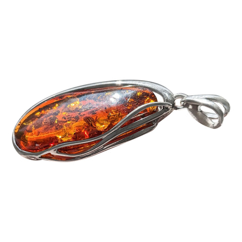 Inti Amber Silver Pendant and chain .